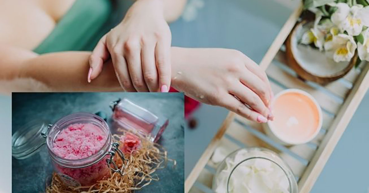 Photo of jar with pink sugar scrub in it and woman rubbing scrub on her arm